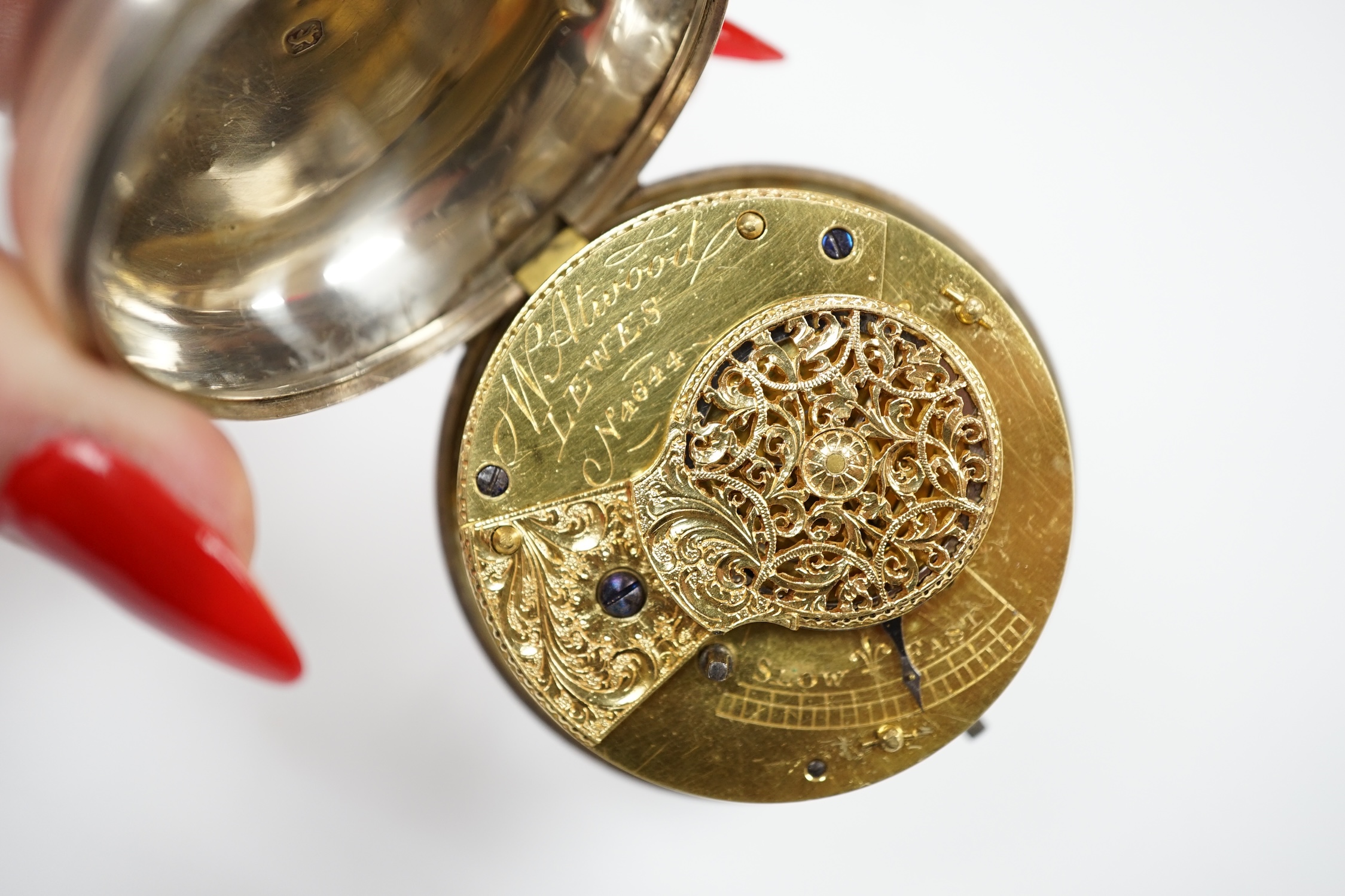 A George III silver pair cased keywind verge pocket watch, by W, Atwood of Lewes, with Roman dial and signed movement numbered 4644, outer case diameter 56mm.